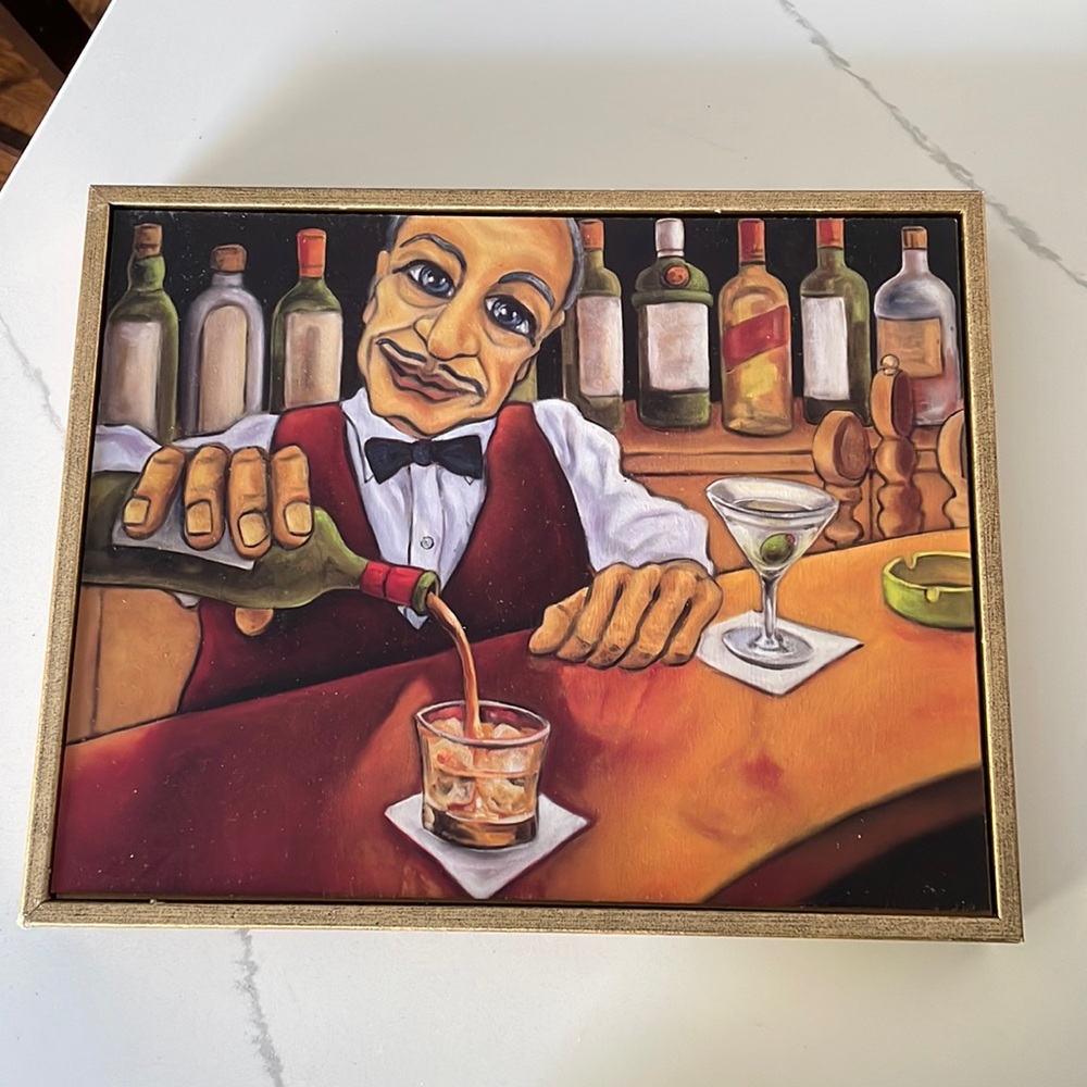 Basil the Bartender Pouring a Drink on the Rocks painted on wood board